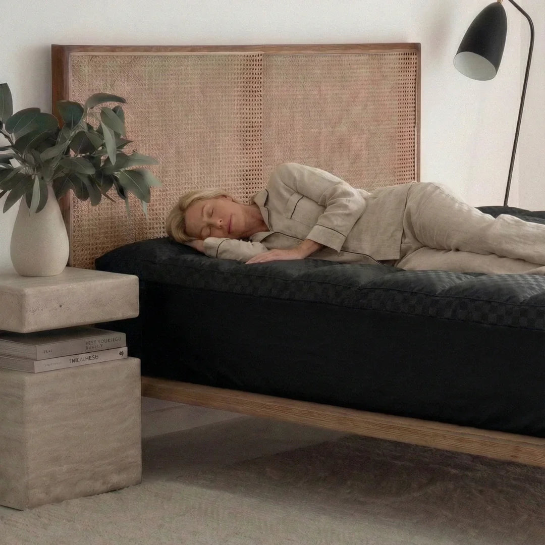 Person lying on the bed